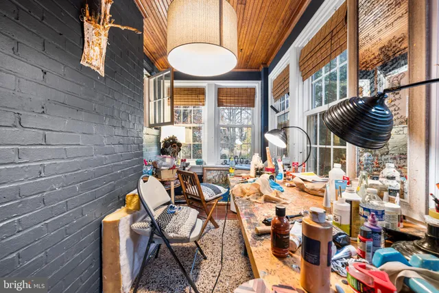 a view of a chairs and table in a patio