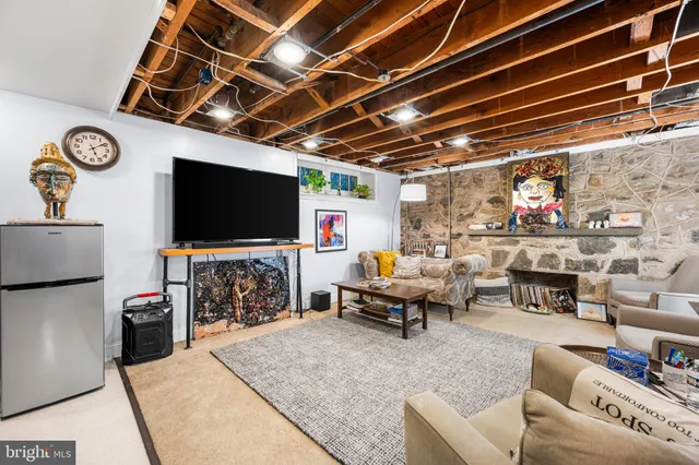 a bathroom with a sink mirror and toilet