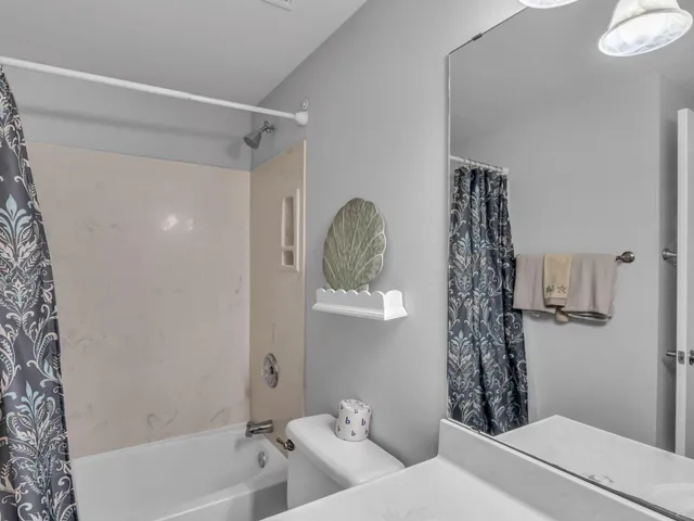 a view of a balcony with an ocean view