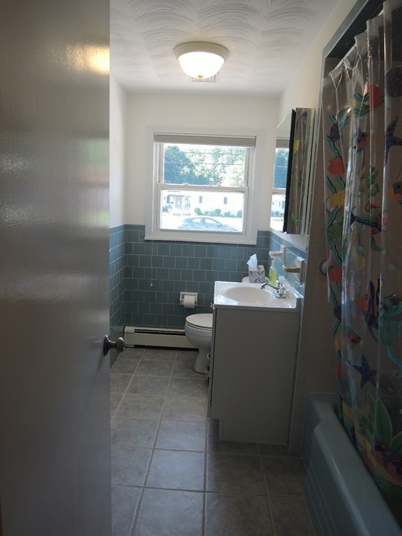 5 Temi Road Framingham, MA 01701 - Photo 11 of 27 a bathroom with a sink toilet and shower
