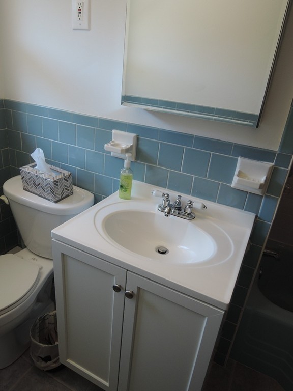5 Temi Road Framingham, MA 01701 - Photo 12 of 27 a bathroom with a sink toilet and a mirror
