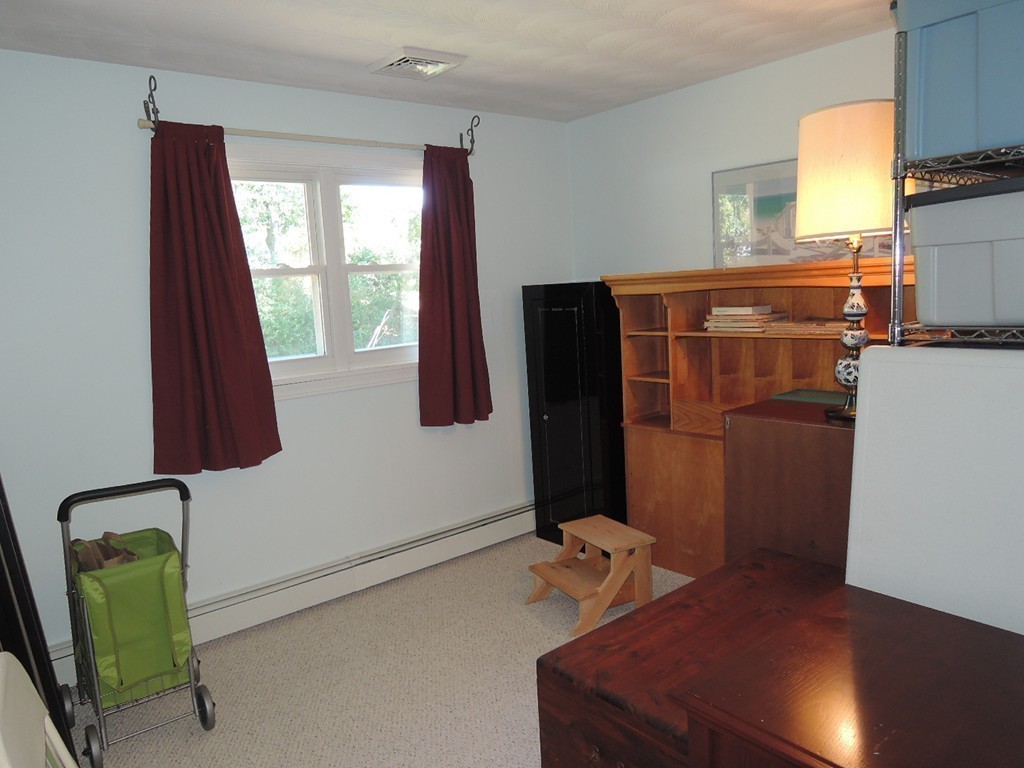 5 Temi Road Framingham, MA 01701 - Photo 17 of 27 a room with furniture and a window