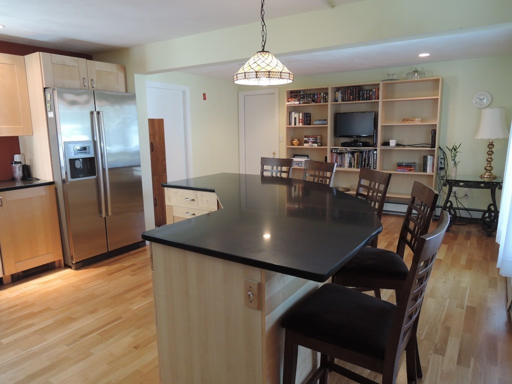 5 Temi Road Framingham, MA 01701 - Photo 6 of 27 a view of a dining room with furniture window and wooden floor