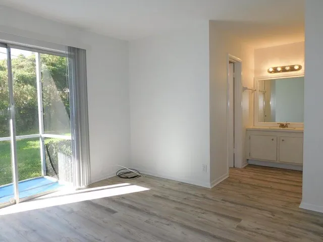 a view of a bathroom with a sink and a fireplace