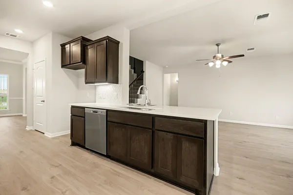 a bathroom with a sink vanity and mirror