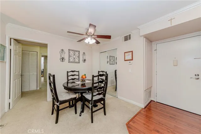 a view of a dining room with furniture