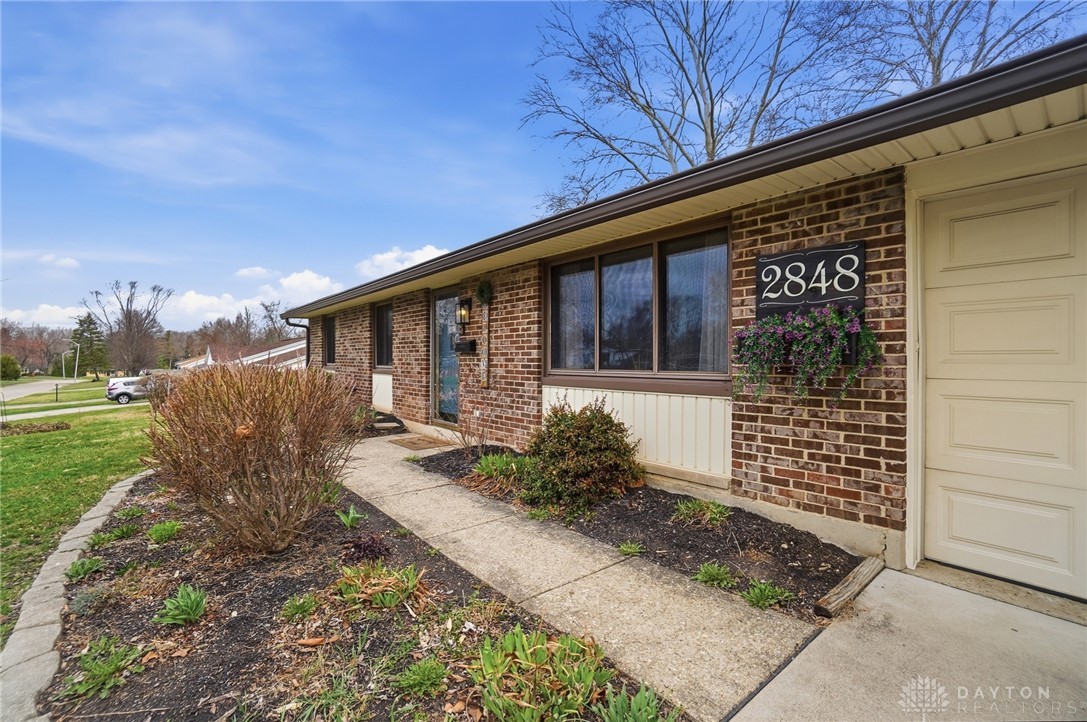 2848 Ellen Lane Dayton, OH 45430 - Photo 13 of 62 This classic brick residence features a well-maintained exterior and inviting curb appeal.