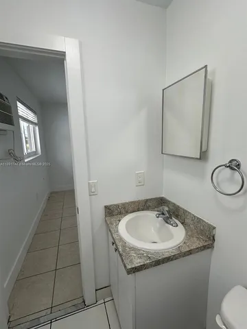 a bathroom with a sink and a toilet