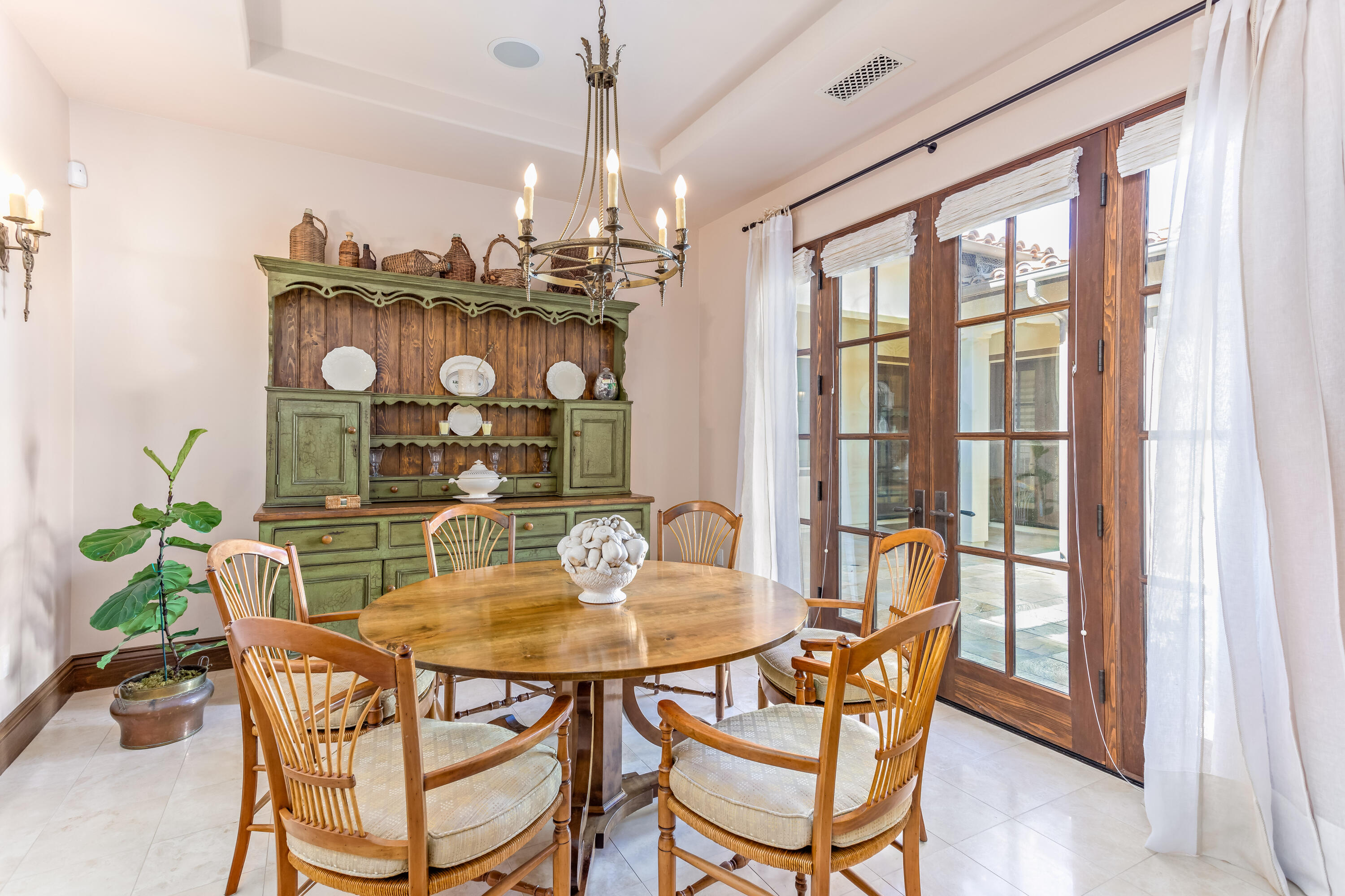 7732 Kestrel Lane Goleta, CA 93117 - Photo 12 of 33 Formal Dining roon opens to Courtyard