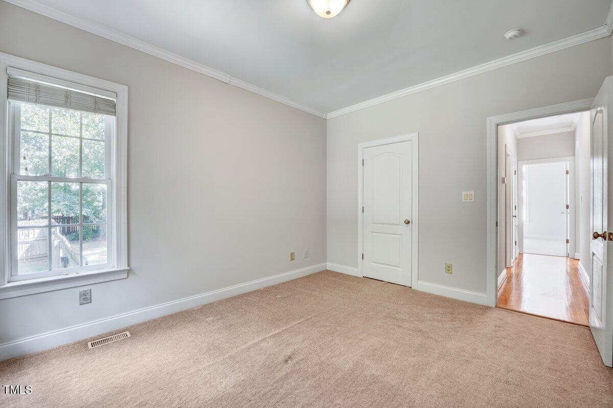 1321 Taylor Farm Road Raleigh, NC 27603 - Photo 30 of 41 a view of an empty room with a window