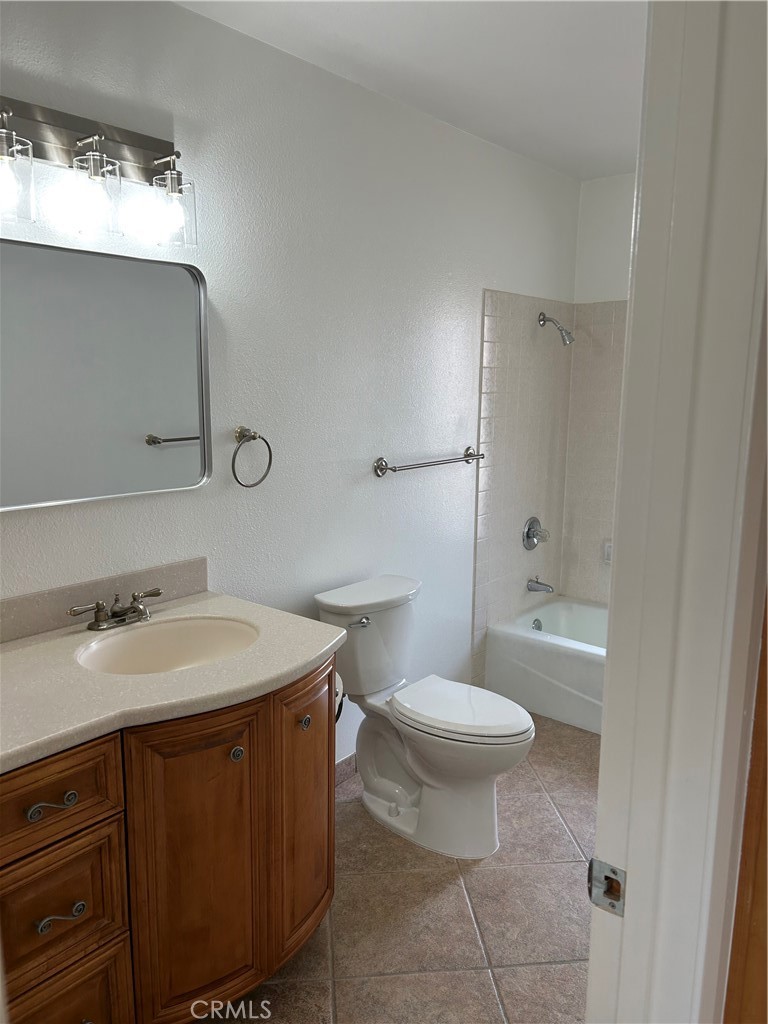1915 Silver Oak Way Hemet, CA 92545 - Photo 14 of 17 a bathroom with a sink toilet and shower