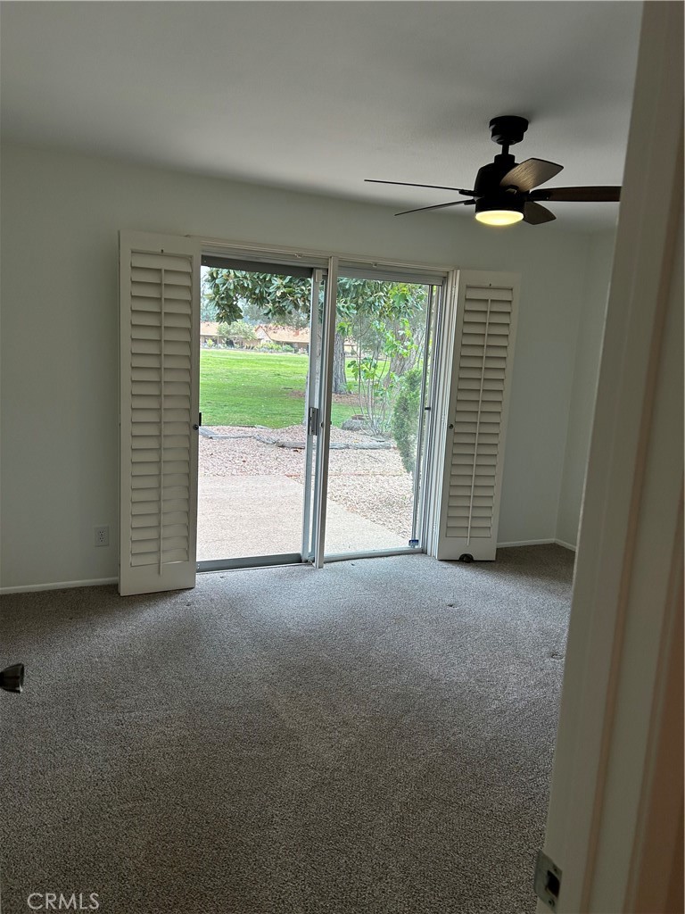 1915 Silver Oak Way Hemet, CA 92545 - Photo 9 of 17 a view of empty room with ceiling fan
