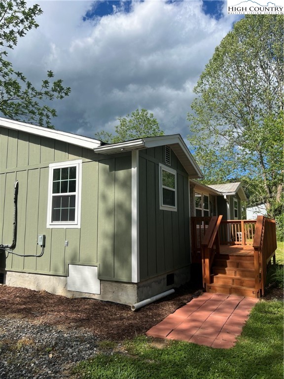 9635 Highway 194 Lansing, NC 28643 - Photo 3 of 28 a view of a house with backyard