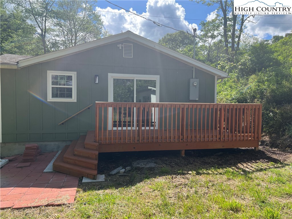 9635 Highway 194 Lansing, NC 28643 - Photo 5 of 28 a view of a house with a yard