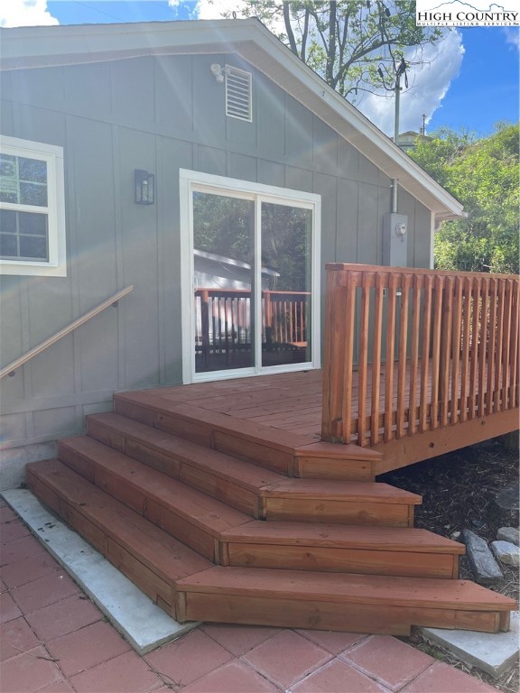 9635 Highway 194 Lansing, NC 28643 - Photo 6 of 28 a balcony view with a garden