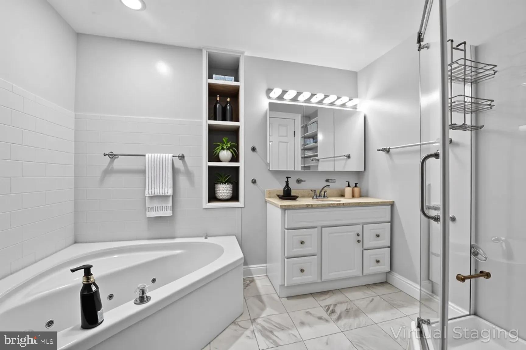 1251 I Street Northeast Washington, DC 20002 - Photo 12 of 31 a bathroom with a tub sink and mirror