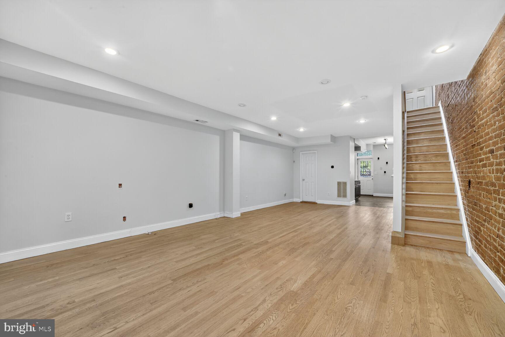 1251 I Street Northeast Washington, DC 20002 - Photo 20 of 31 a view of empty room with wooden floor