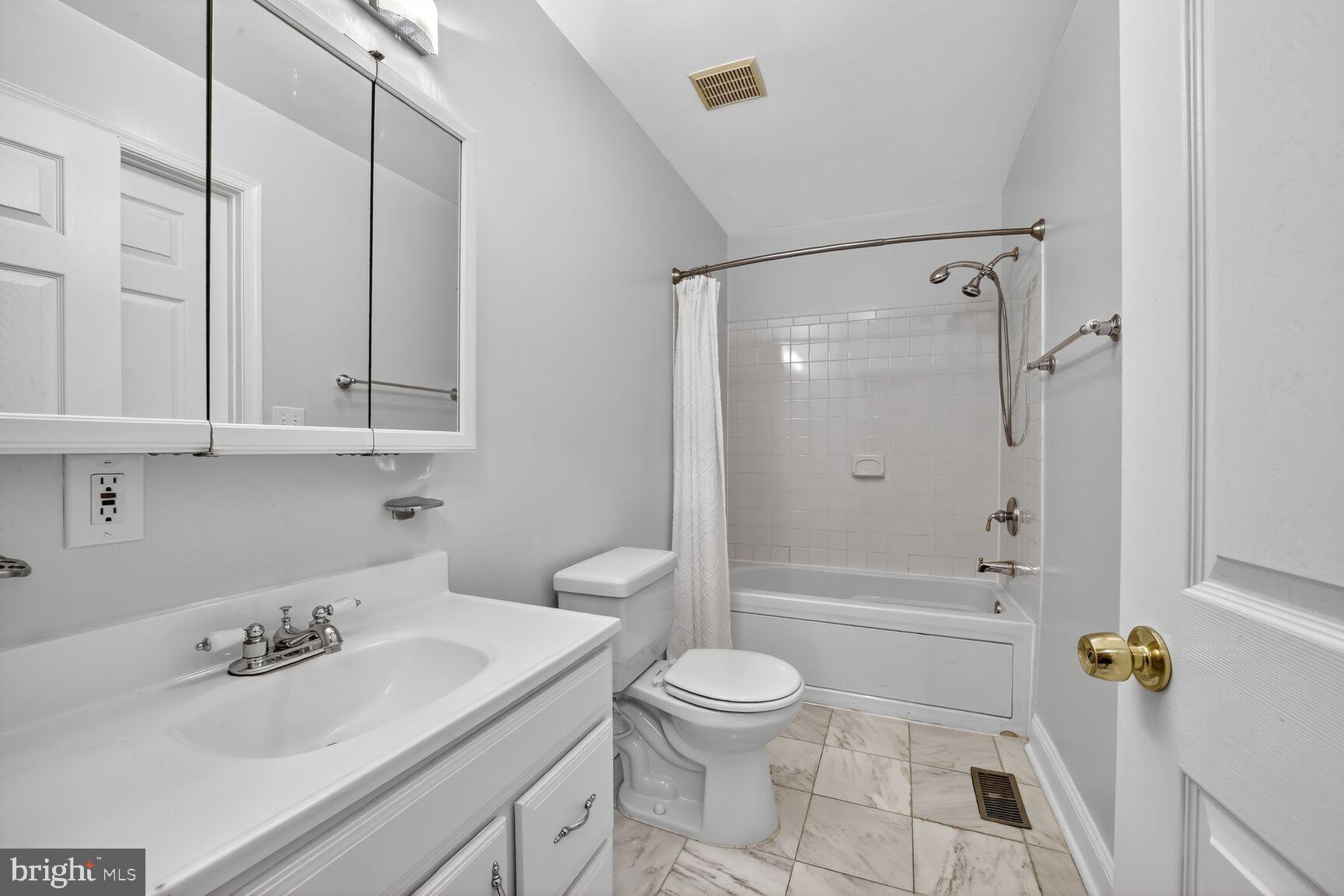 1251 I Street Northeast Washington, DC 20002 - Photo 25 of 31 a bathroom with a sink toilet and shower