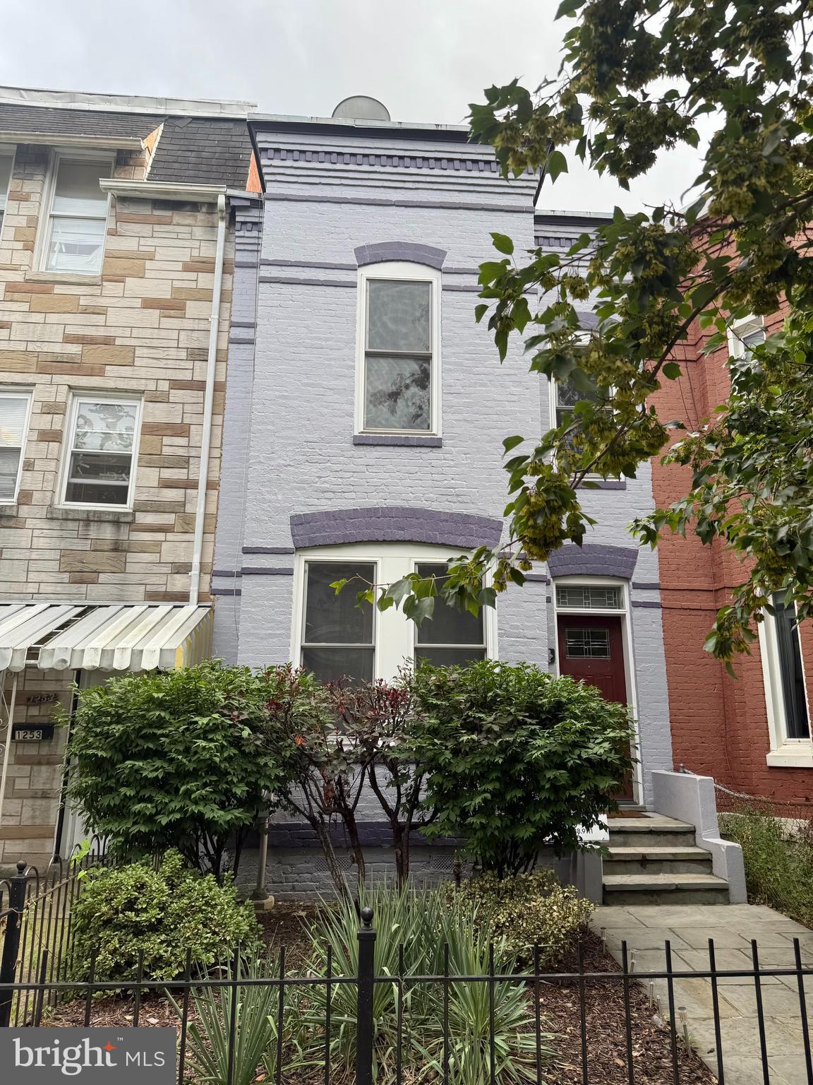 1251 I Street Northeast Washington, DC 20002 - Photo 28 of 31 a front view of a house with a yard