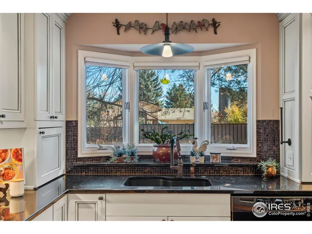 a view of a living room and window