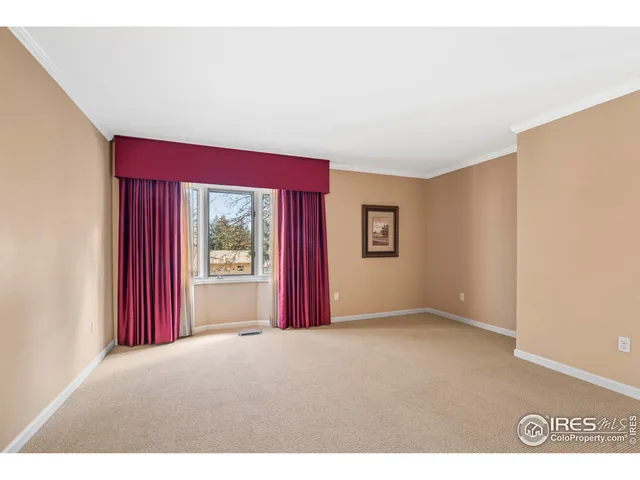 a view of a room with a large window