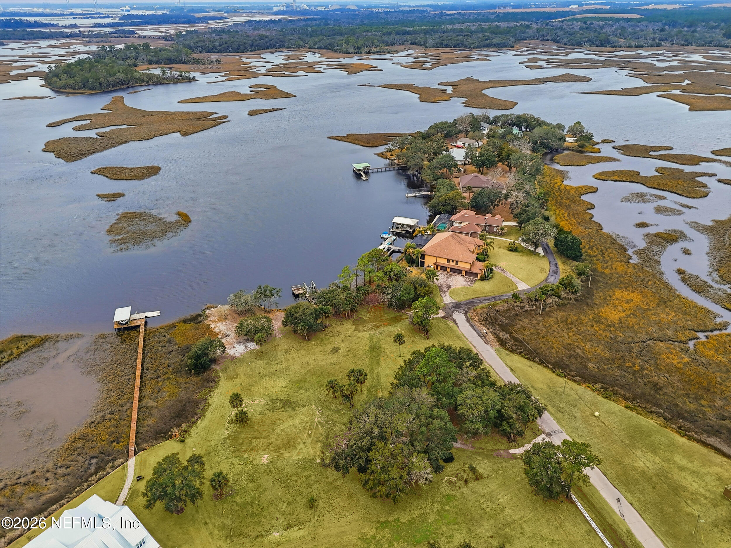 5895 Sheffield Road Jacksonville, FL 32226 - Photo 13 of 13 an aerial view of residential houses with outdoor space