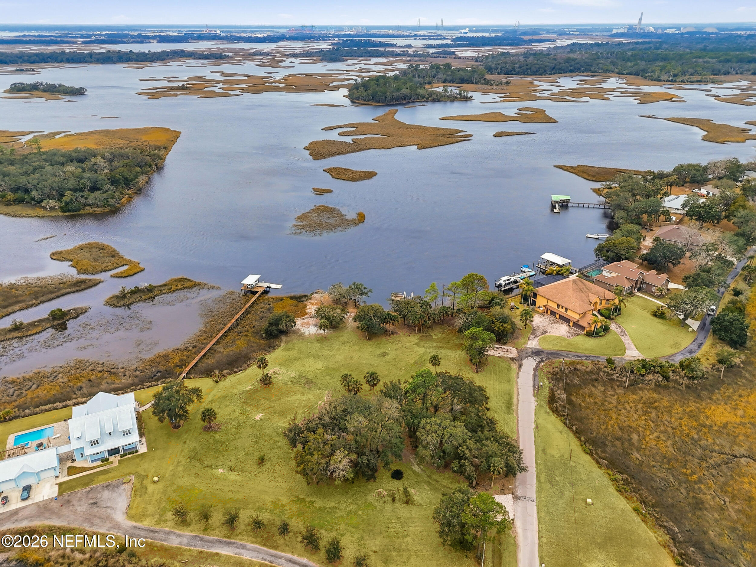 5895 Sheffield Road Jacksonville, FL 32226 - Photo 2 of 13 an aerial view of ocean with residential house and outdoor space