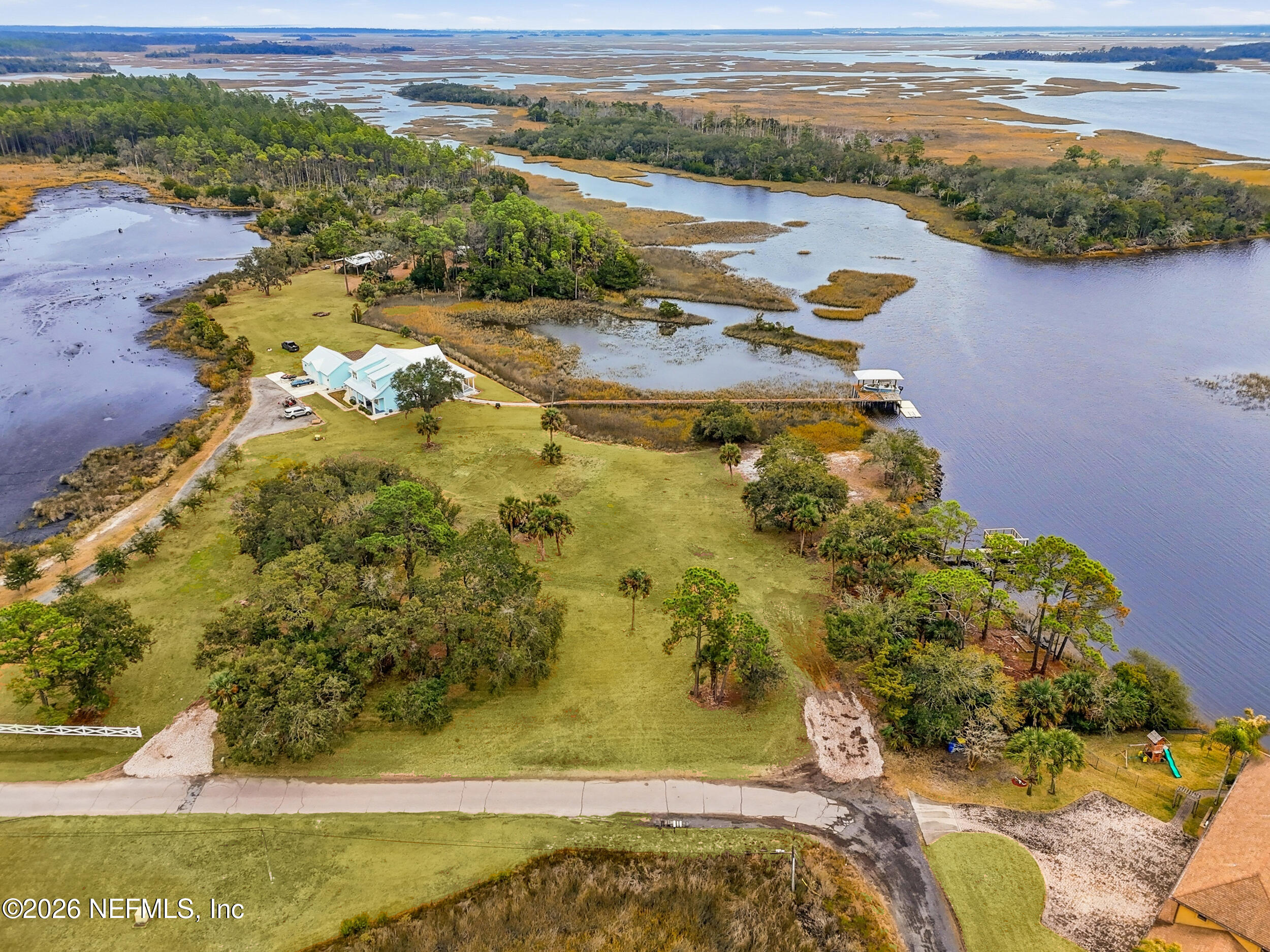 5895 Sheffield Road Jacksonville, FL 32226 - Photo 4 of 13 a view of lake view and mountain view