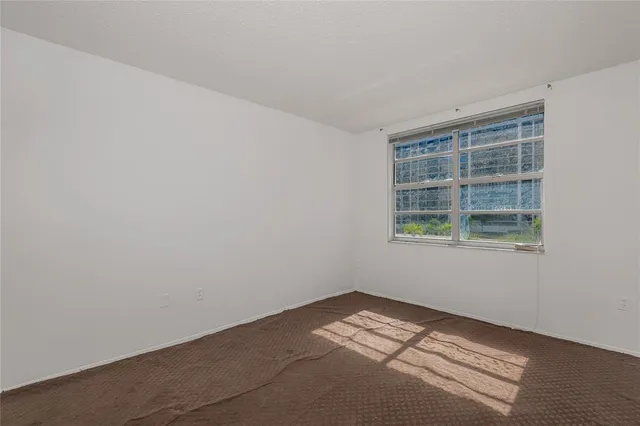a bathroom with a double vanity sink toilet and shower