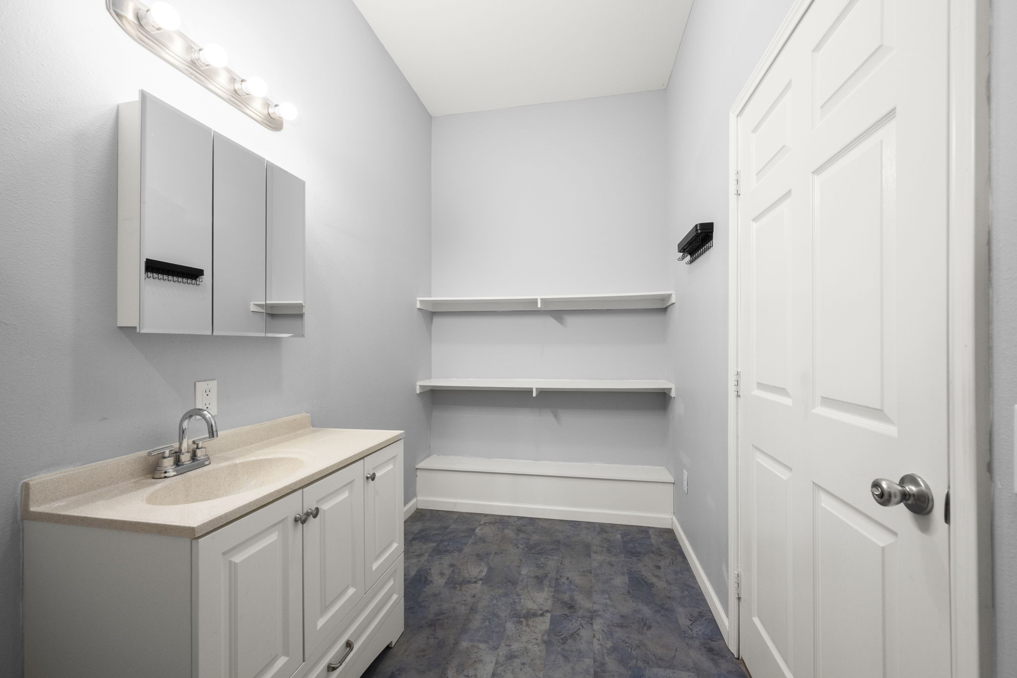 10871 Coaster Lane Conroe, TX 77306 - Photo 25 of 37 Primary bath storage.