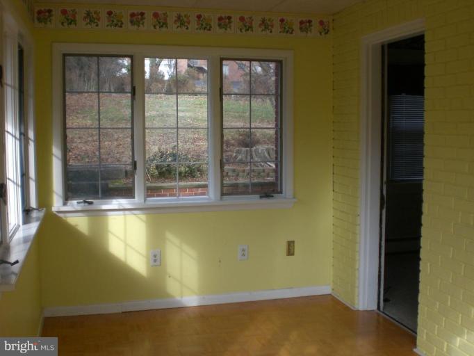 829 Buckingham Road Cumberland, MD 21502 - Photo 20 of 25 Sunroom