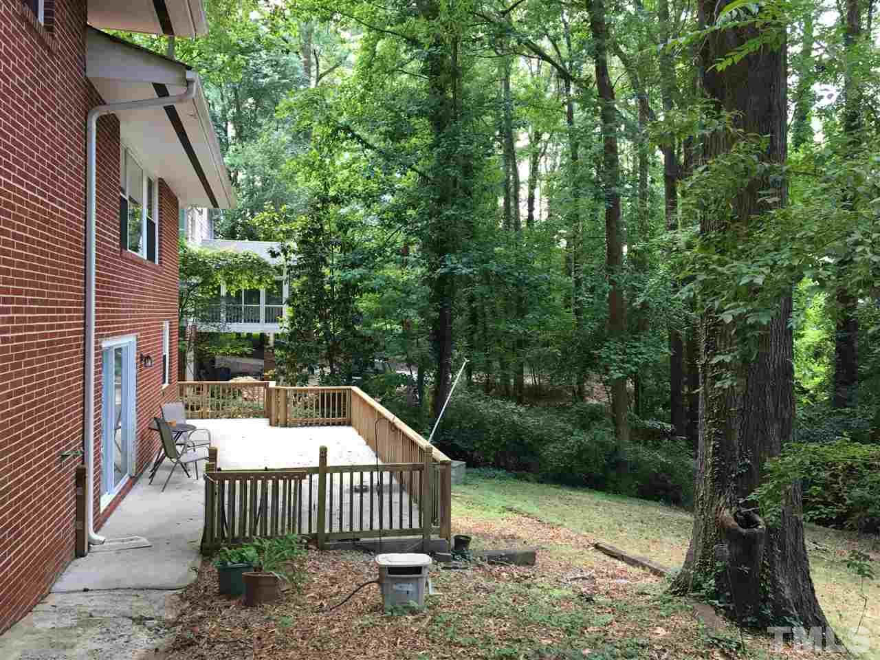 3614 Hope Valley Road Durham, NC 27707 - Photo 2 of 4 a front view of a house with garden and patio