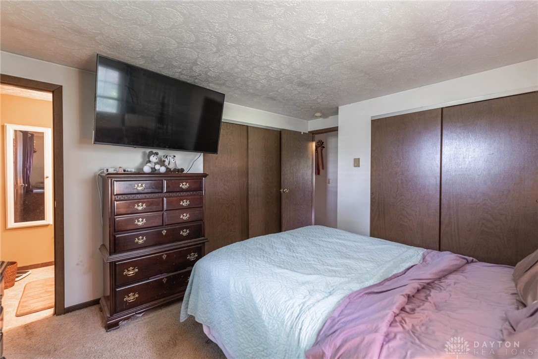 6860 Johnson Road Springfield, OH 45502 - Photo 20 of 31 Master Bedroom with half bath