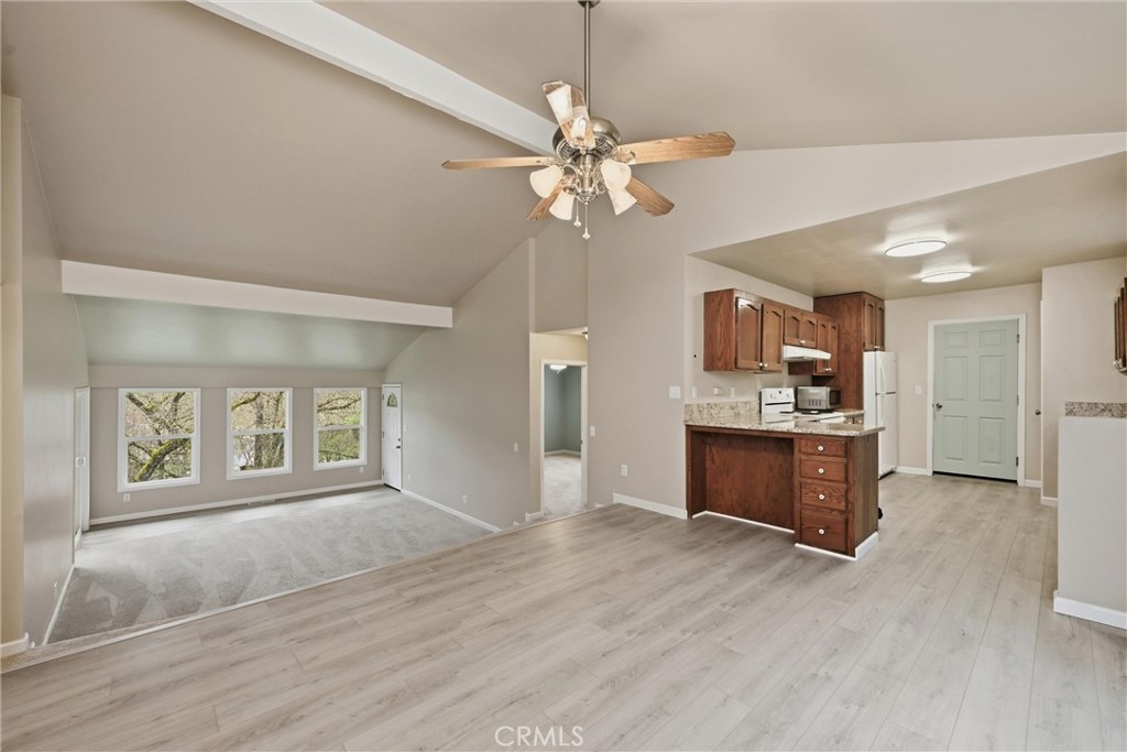 19474 Donkey Hill Road Hidden Valley Lake, CA 95467 - Photo 10 of 38 a view of a kitchen with a sink and a window