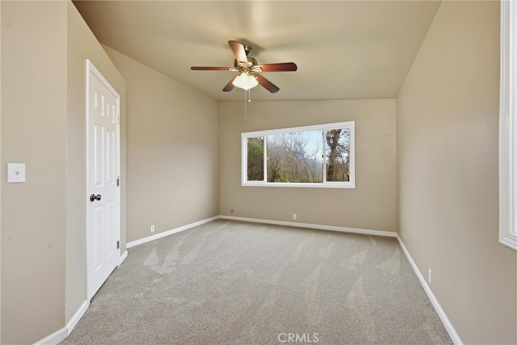 19474 Donkey Hill Road Hidden Valley Lake, CA 95467 - Photo 22 of 38 a view of empty room with window