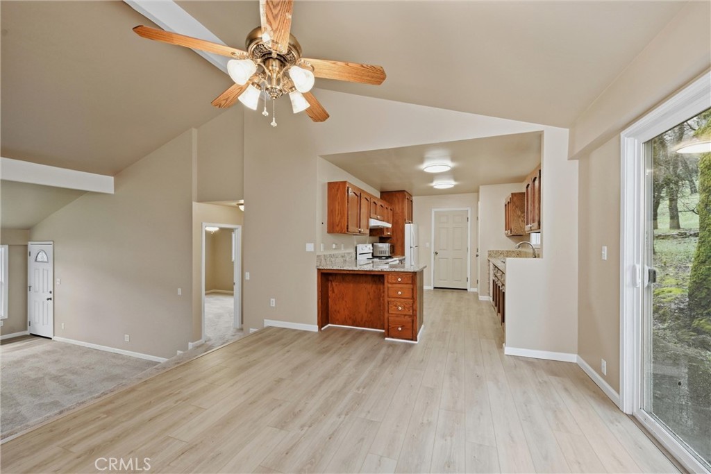 19474 Donkey Hill Road Hidden Valley Lake, CA 95467 - Photo 9 of 38 a view of an empty room and kitchen view