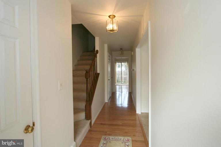 1003 Windrush Lane, Unit 16 Sandy Spring, MD 20860 - Photo 2 of 9 Entry features hardwood floors