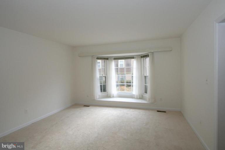 1003 Windrush Lane, Unit 16 Sandy Spring, MD 20860 - Photo 3 of 9 Light filled gracious living room