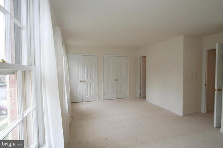 1003 Windrush Lane, Unit 16 Sandy Spring, MD 20860 - Photo 5 of 9 Light filled Master Bedroom