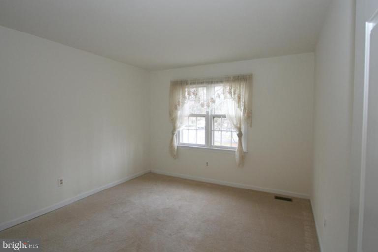 1003 Windrush Lane, Unit 16 Sandy Spring, MD 20860 - Photo 7 of 9 3rd bedroom with large closet