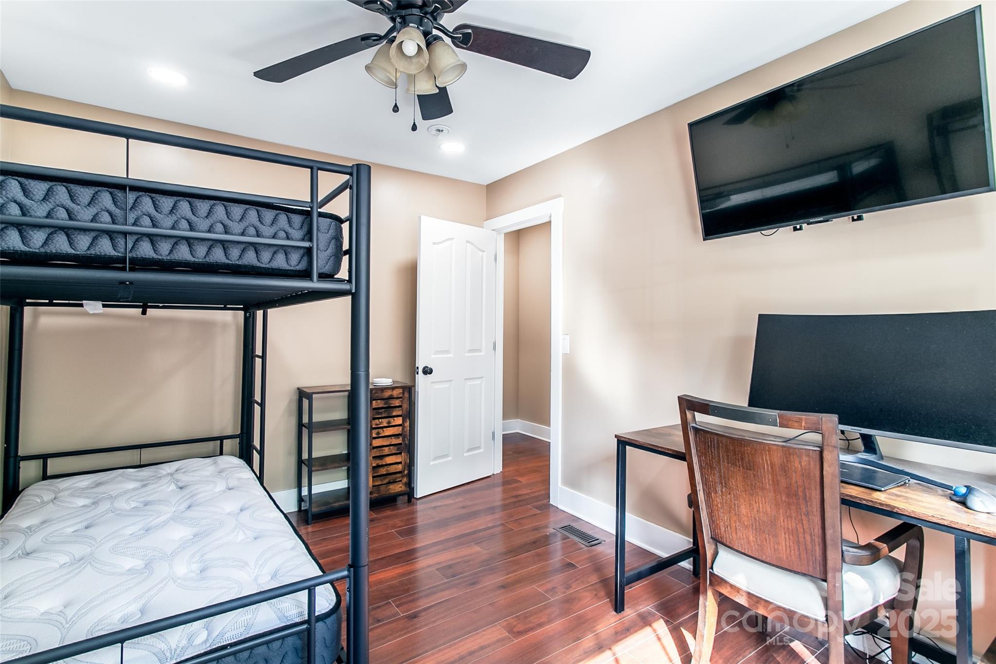 115 Cold Springs Drive Mill Spring, NC 28756 - Photo 11 of 42 a living room with furniture and a flat screen tv