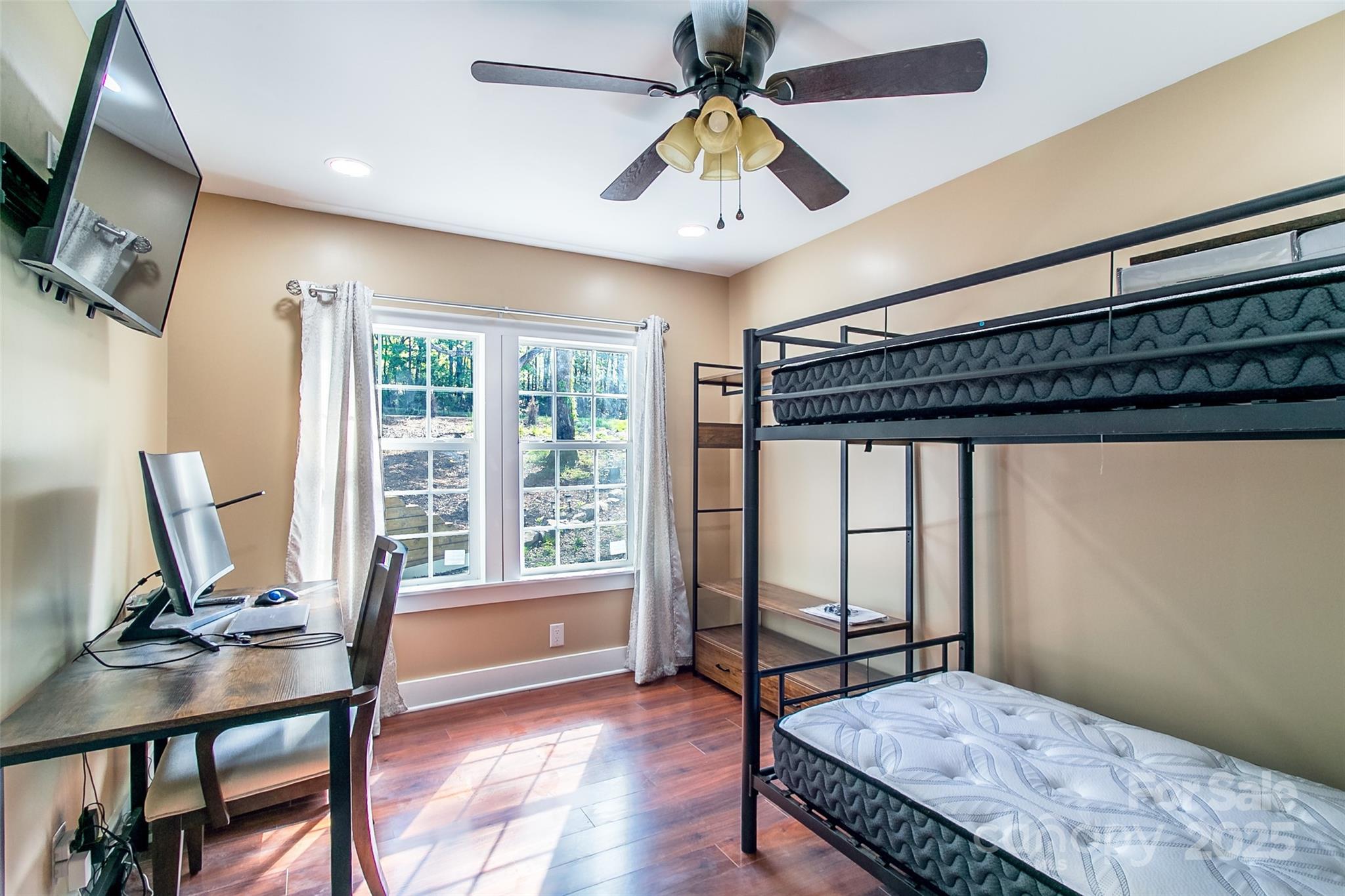 115 Cold Springs Drive Mill Spring, NC 28756 - Photo 13 of 42 a bedroom with furniture and a window