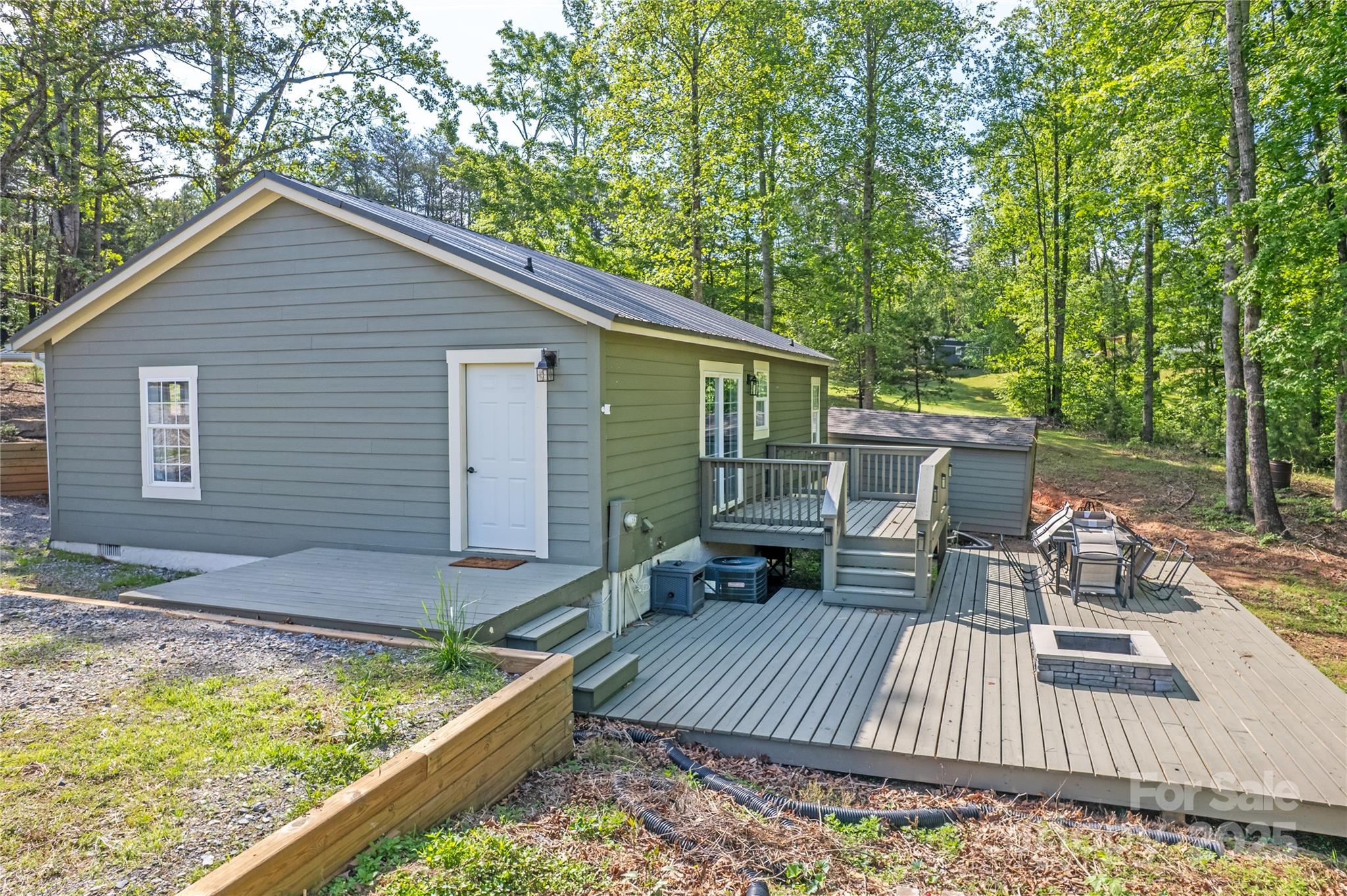 115 Cold Springs Drive Mill Spring, NC 28756 - Photo 42 of 42 a view of roof deck with wooden floor and seating space