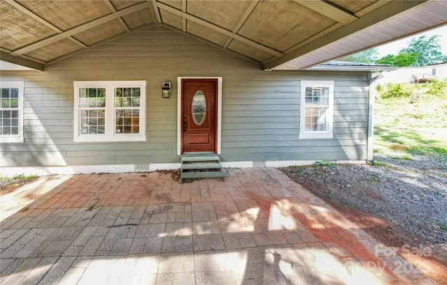 a view of a backyard of a house