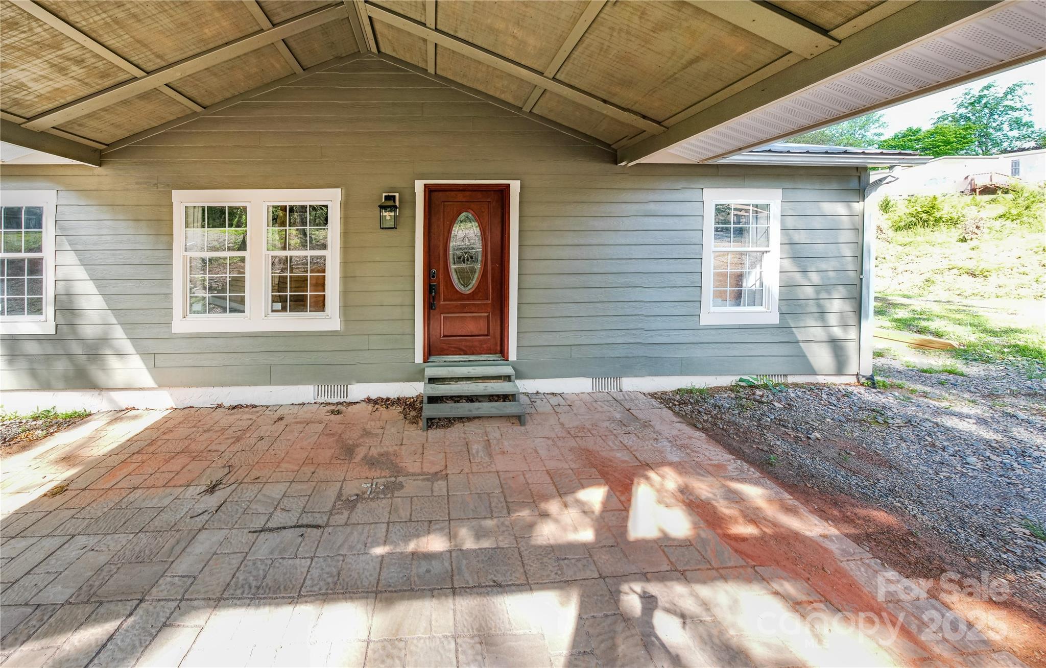 115 Cold Springs Drive Mill Spring, NC 28756 - Photo 5 of 42 a view of a backyard of a house