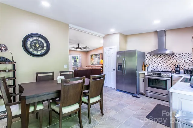 a view of a dining room with furniture