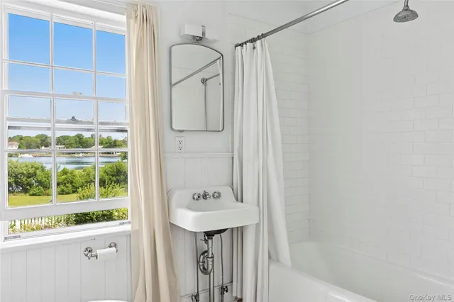 a view of a house with a yard and plants