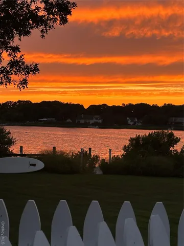 a view of a porch and wooden floor