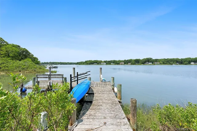a view of lake from balcony with outdoor space