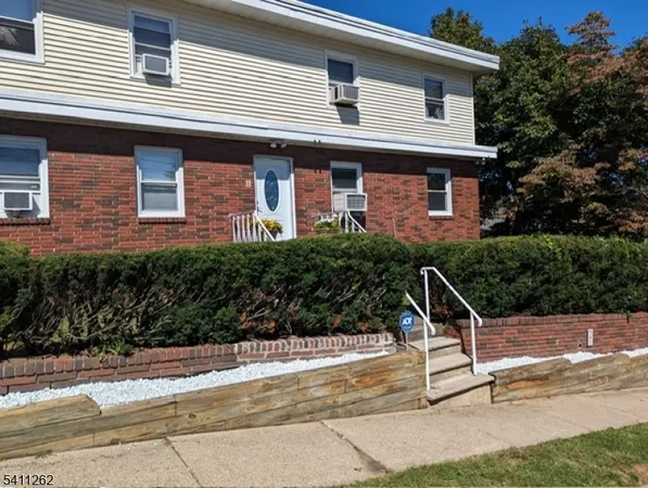 a view of a house with a patio
